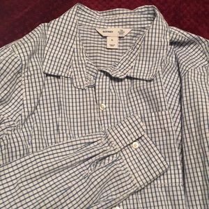 Women’s button-up shirt.
